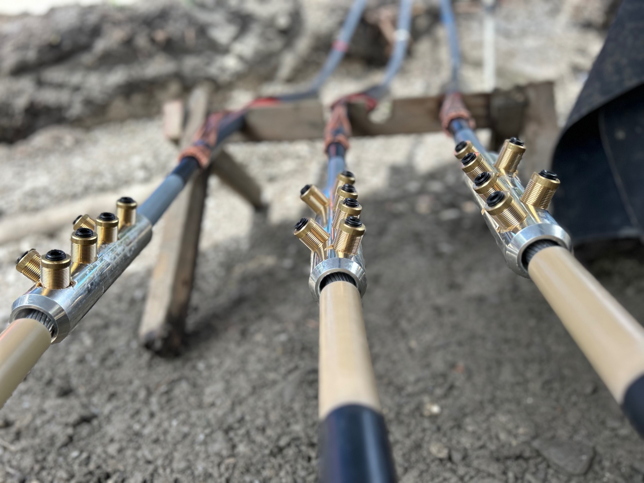 Three prepared cables with mechanical connectors during industrial cable jointing works